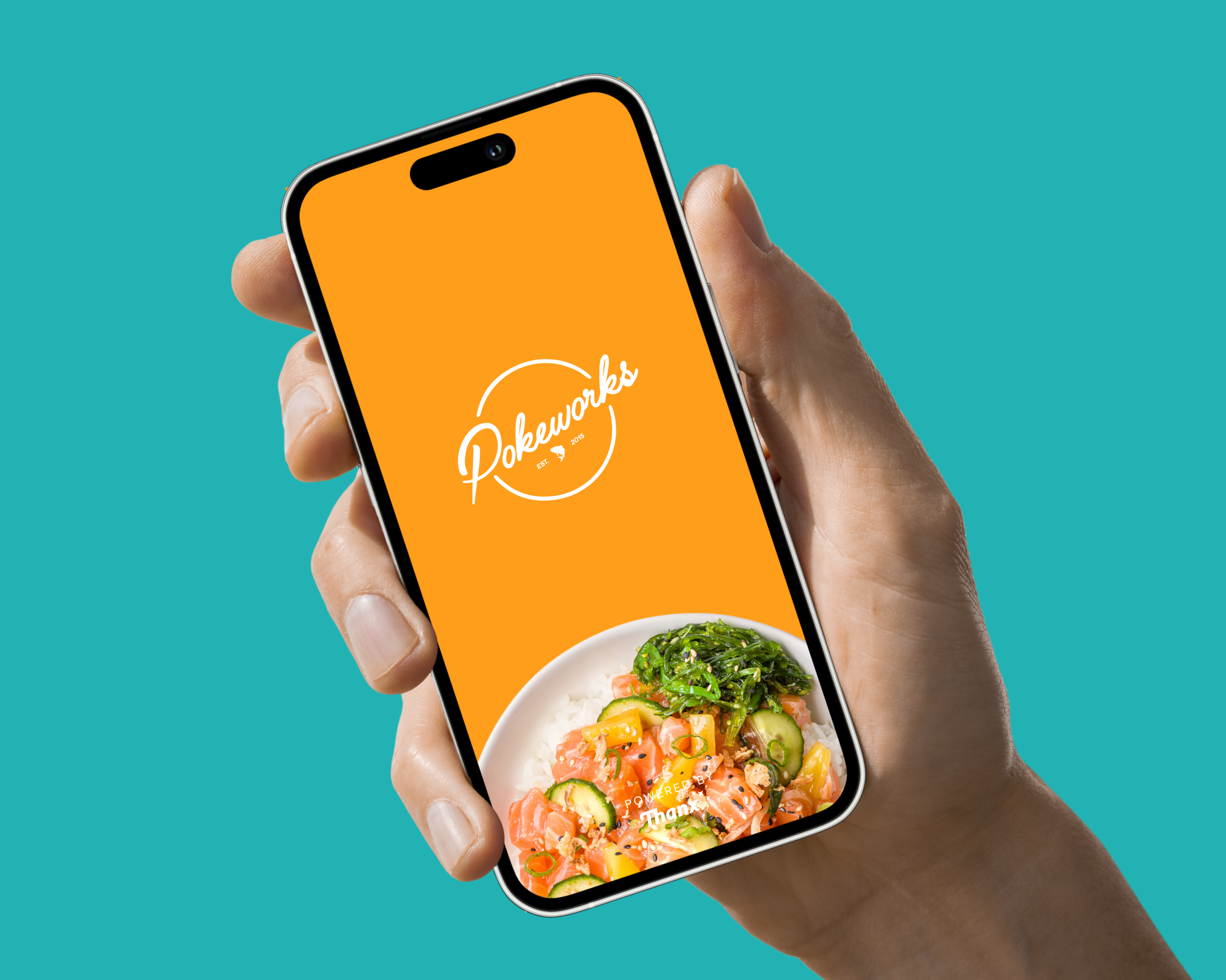 A hand holding a phone where pokeworks App is showing